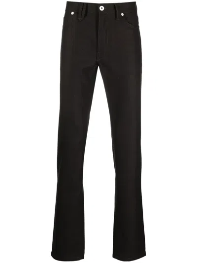 Brioni Low-rise Slim-fit Tapered Trousers In 褐色