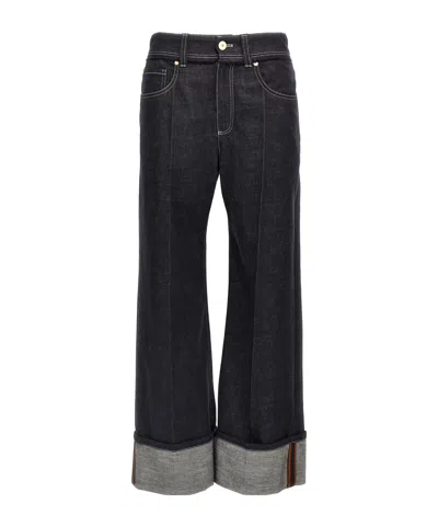 BRUNELLO CUCINELLI BRUNELLO CUCINELLI HIGH-WAISTED TURN-UP BRIM JEANS