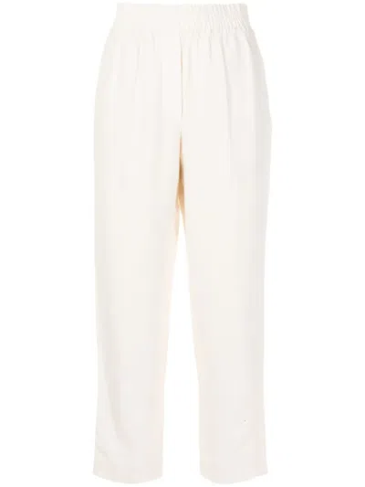 Brunello Cucinelli Pleated Cotton-blend Jersey Tapered Pants In White