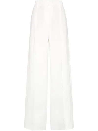 BRUNELLO CUCINELLI BRUNELLO CUCINELLI LINEN TROUSERS WITH SHINY DETAILS