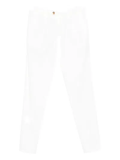 Brunello Cucinelli Men Garment-dyed Leisure Fit Pants In Transparent