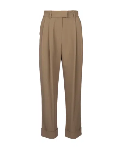 Brunello Cucinelli Pleated Tapered Trousers In Brown
