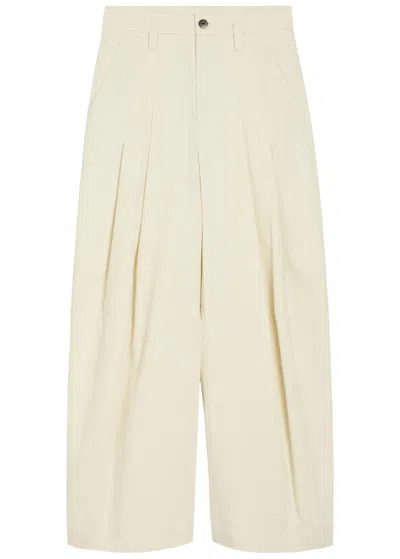 Brunello Cucinelli Dyed Cotton And Wool Wrinkled Denim Five-pocket Baggy Trousers With Monili In Animal Print