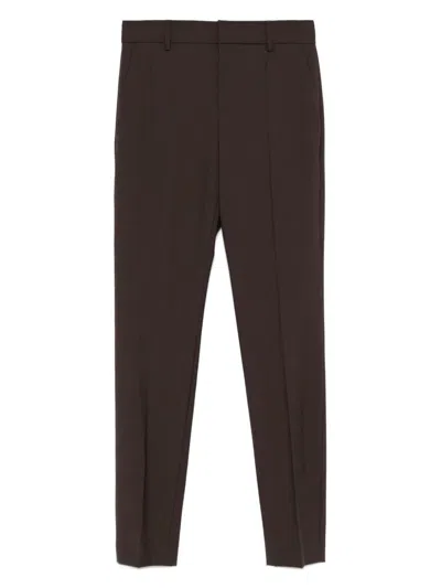 Brunello Cucinelli Tailored Wool Pants With A Tapered Fit In Brown