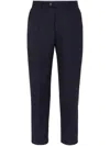 Brunello Cucinelli Tapered-leg Wool Trousers In Blue