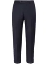 Brunello Cucinelli Tapered-leg Wool Trousers In Blue
