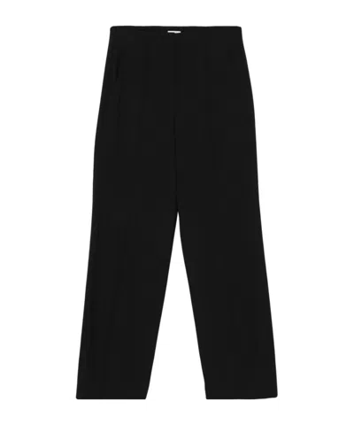 Brunello Cucinelli Tapered Trousers In Black