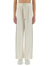 Brunello Cucinelli Wide-fit Track Pants With Elegant Side Detailing In Beige