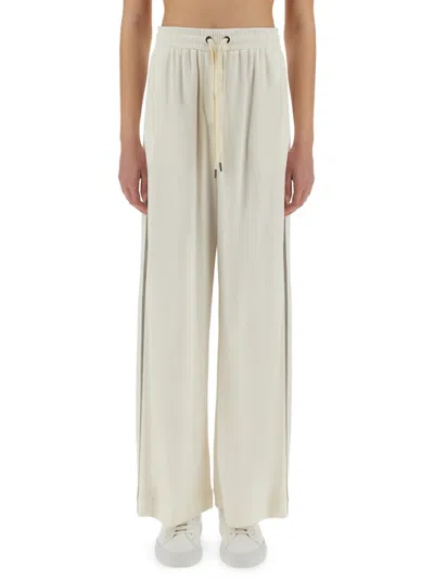 BRUNELLO CUCINELLI TRACK PANTS WITH NECKLACE