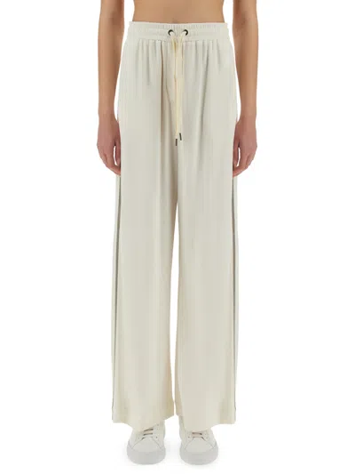 BRUNELLO CUCINELLI TRACK PANTS WITH NECKLACE