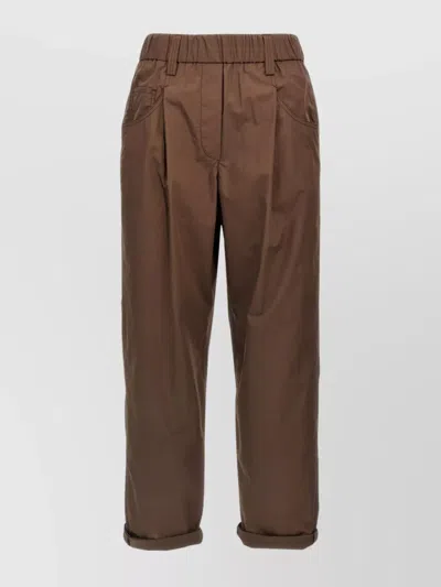 Brunello Cucinelli Trousers Featuring Elastic Waistband And Rolled Cuffs In Brown