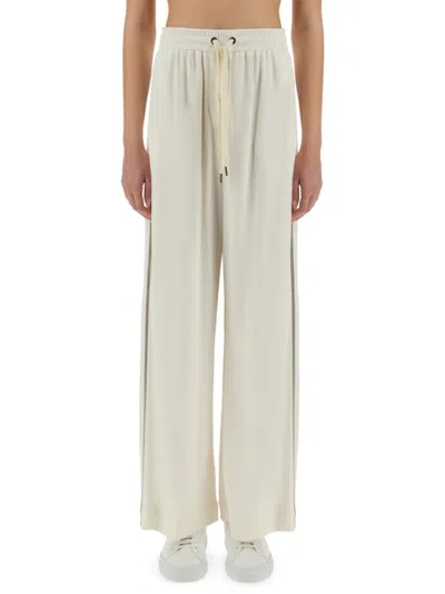 Brunello Cucinelli Wide-fit Track Pants With Elegant Side Detailing In Ivory