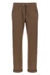 Brunello Cucinelli Shiny Pocket Detail Joggers In Brown