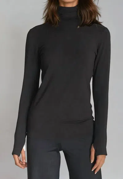 Buki Collagen Turtleneck Top In Black