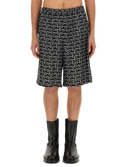 Burberry All Over Print Bermuda Shorts In Black