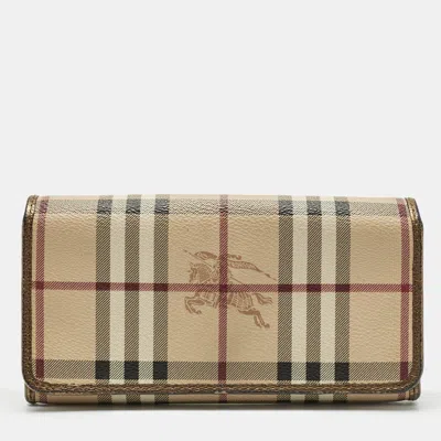 Pre-owned Burberry Beige/bronze Coated Canvas Flap Continental Wallet In Sand