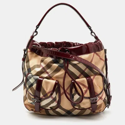 Pre-owned Burberry Beige/burgundy Nova Check Pvc And Patent Leather Drawstring Hobo In Sand