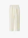 Burberry Tapered-leg Canvas Trousers In Cream