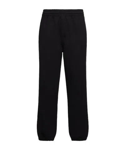 Burberry Check Label Jogging Pants In Black