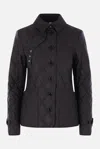 Burberry Coats In Black