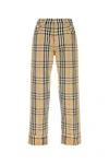 Burberry Beige Pants With Ekd Embroidery On The Rear And Check Motif All-over In Tech Fabric Man