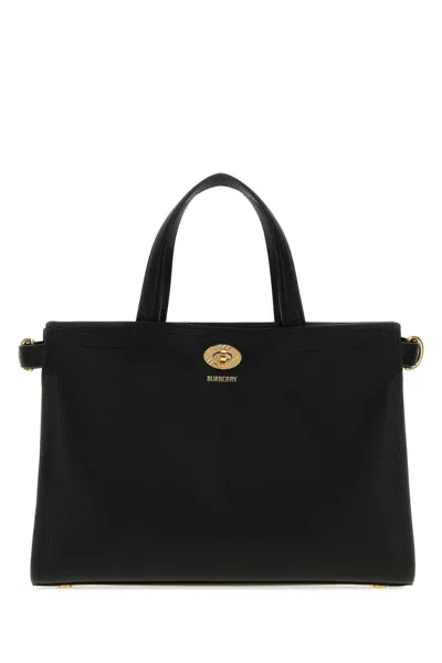 Burberry Grained Calf Leather Top Handle Bag In Black