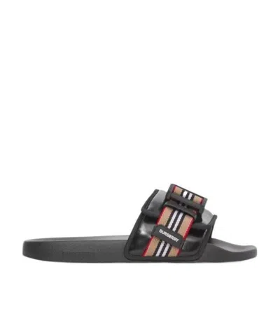 Burberry Icon Stripe Buckled Slides In Black