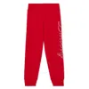 Burberry Script Logo-print Cotton Track Trousers In Red