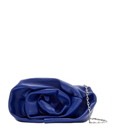 Burberry Leather Rose Clutch In Blue