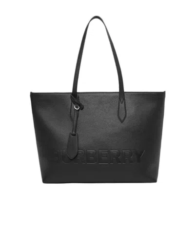 Burberry Logo Embossed Medium Handbag In Black