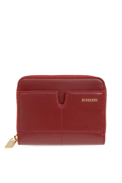 Burberry Logo Embossed Zip In Red