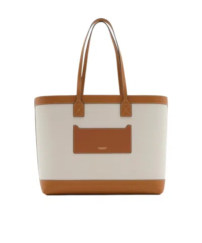 Burberry Logo Medium Handbag In Brown