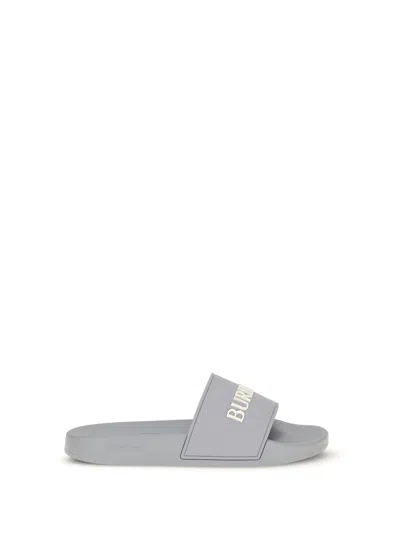 Burberry Logo-embossed Rubber Slides In Gray