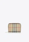 Burberry Mini Zip Around Wallet In Neutral