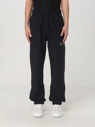 Burberry Embroidered Logo Cotton Sweatpants In Black