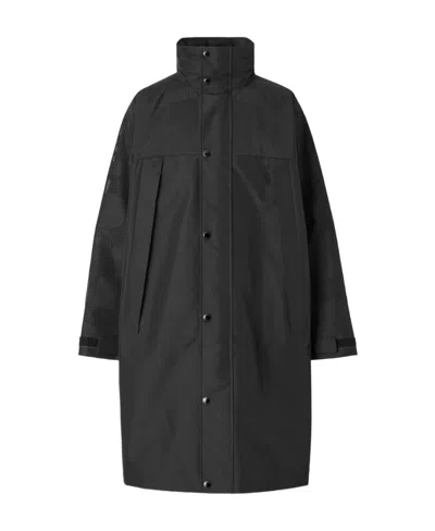 Burberry Perforated-logo Packaway-hood Technical Car Coat In Black