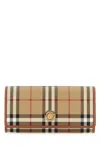BURBERRY PRINTED CANVAS AND LEATHER CONTINENTAL WALLET