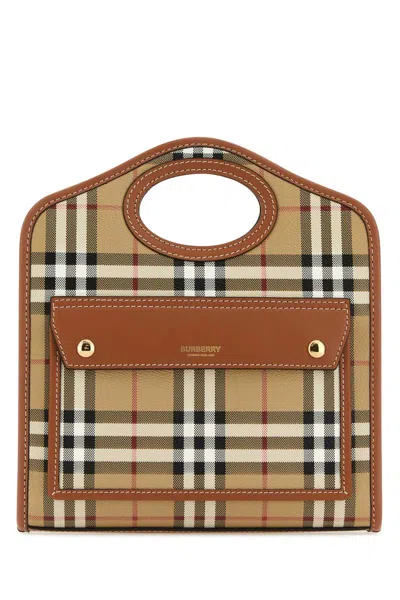 Burberry Printed Canvas And Leather Mini Pocket Handbag In Brown