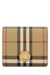 Burberry Logo Engraved Checked Folded Wallet In Archivebeige
