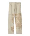 Shop Burberry Ekd Jeans In Rubble