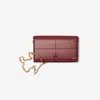 Burberry Logo-stamp Leather Clutch Bag In Ruby