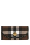 BURBERRY BURBERRY WOMAN PRINTED CANVAS AND LEATHER WALLET