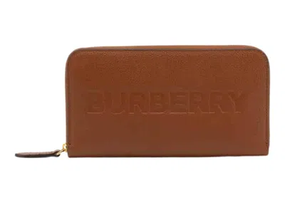 Pre-owned Burberry Women's  Embossed Leather Ziparound Wallet In Tan