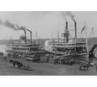 Buyenlarge Two Steamboats Along The Levee At The Mississippi River - Photograph Print In Black;gray