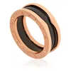 Bvlgari B.zero1 18k Rose Gold And Black Ceramic 2-band Ring In Pink/rose Gold Tone/gold Tone/black