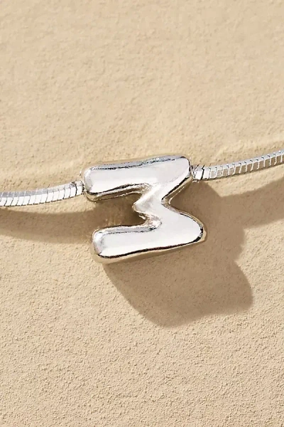 By Anthropologie Barely There Bubble Monogram Necklace In Metallic