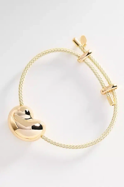 By Anthropologie Bean Pendant Cord Bracelet In Gold