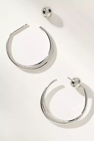 By Anthropologie Crescent Hoop Earrings