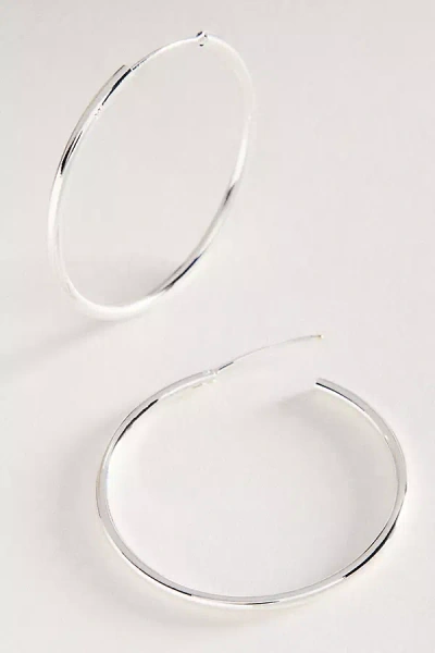 By Anthropologie Delicate Gilded Hoop Earrings In Silver