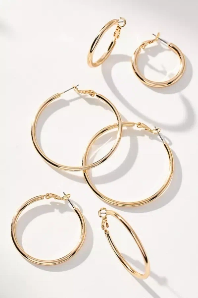 By Anthropologie Delicate Hoop Earrings, Set Of 3 In Gold